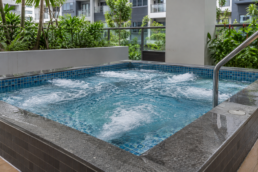 Clean condominium jacuzzi operating after servicing